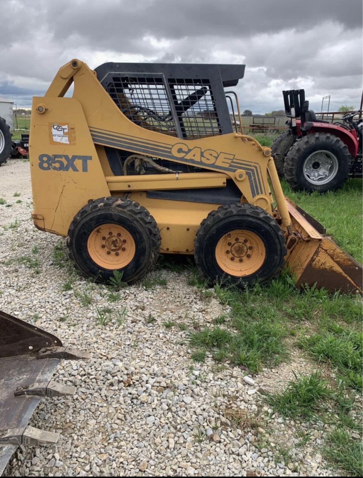 Compact track loader parked after the land-clearing or site-prep work is done