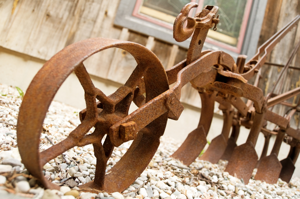 Old rusty equipment displayed like a museum piece after sitting too long unsold